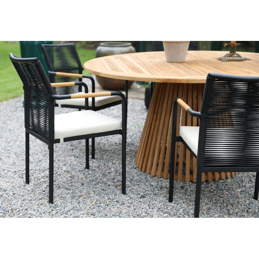 Saltö utomhusmatgrupp runt bord Ø150 cm med 6 Skanör karmstolar – Teak/Svart Saltö utomhusmatgrupp runt bord Ø150 cm med 6 Skanör karmstolar – Teak/Svart