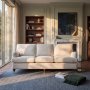 Howard Watford Deluxe svängd 4-sits soffa - 225 cm, beige & hjul i mässing Howard Watford Deluxe svängd 4-sits soffa - 225 cm, beige & hjul i mässing