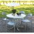 Spisegruppe Holmsund: Rundt hvidt bord inkl. 4 stabelbare Abbe stole