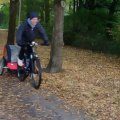 Kundbild Cykelvagn/joggingvagn med st�td�mpare - R�d: Motionsrunda p� mountainbike med...